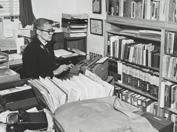 Pauli Murray uses a typewriter in her office