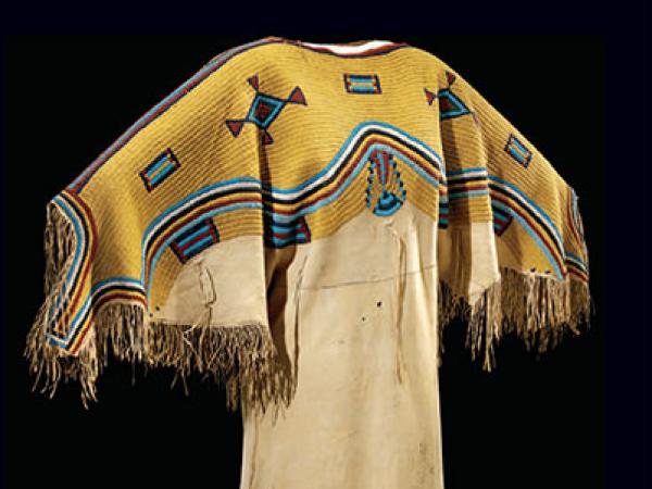 Cover of teaching poster featuring fringed Native American dress