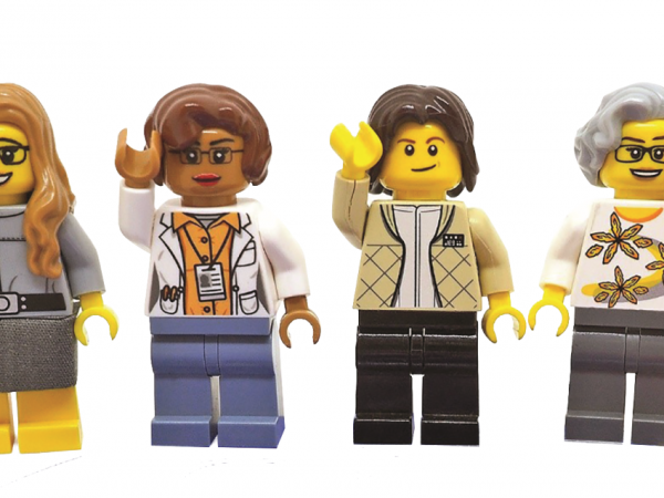 Lego figurines of Margaret Hamilton, Katherine Johnson, Sally Ride, Nancy Grace Roman, and Mae Jemison.