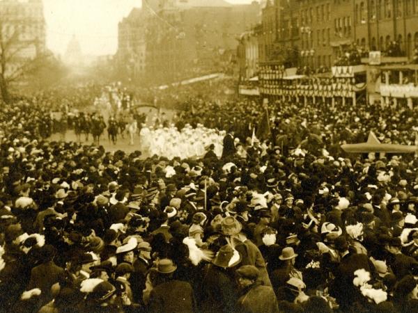 Crowd of people marching