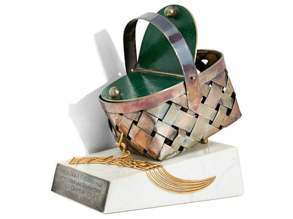 Award with picnic basket and music notes