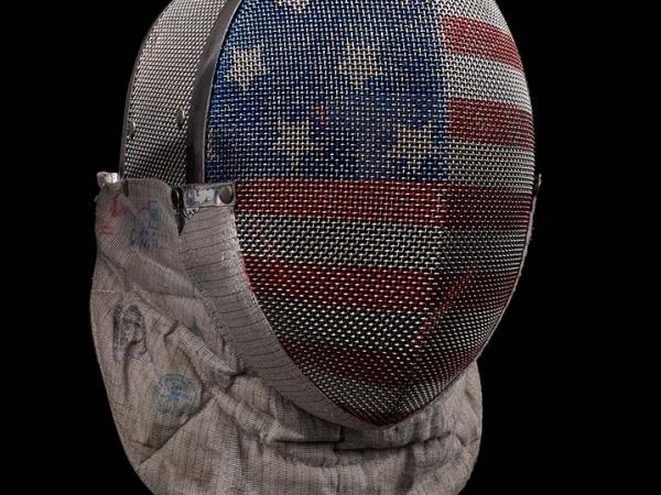 Fencing mask featuring an American flag across the front.