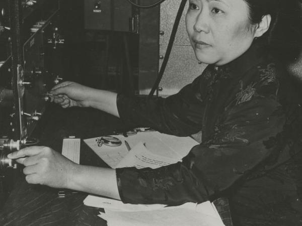 Chien-shiung Wu turns dials on a machine