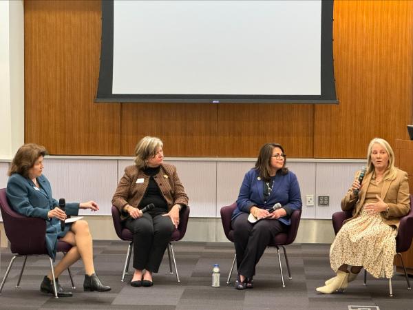 4 women sitting and having a discussion 