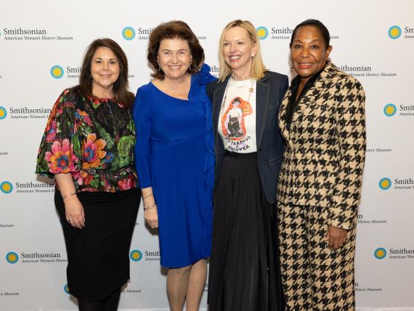 Four women posing for a photo