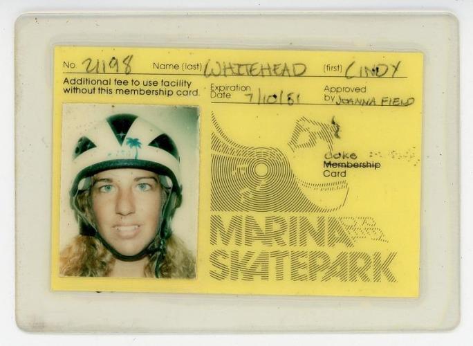 Yellow skate card with photo of Cindy Whitehead in a skate helmet on the left, her name and expiration date on top, and on the right the words: Marina Del Rey Skatepark