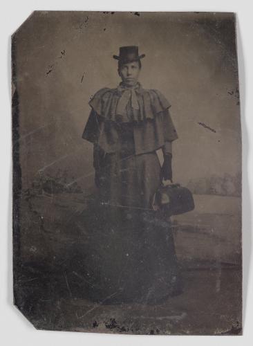 Tintype of a woman carrying a medical bag from around the 1890s. Collection of the Smithsonian National Museum of African American History and Culture.