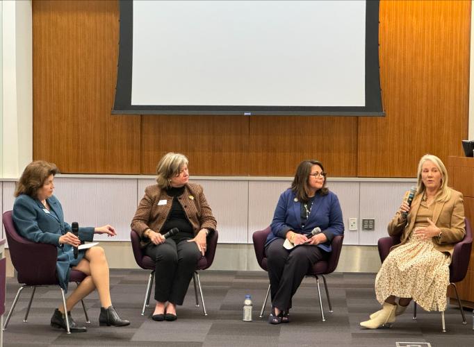 4 women sitting and having a discussion 