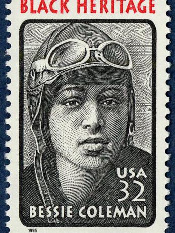 alt=&quot;Stamp featuring an Etching of Bessie Coleman wearing her flying helmet and goggles &quot;